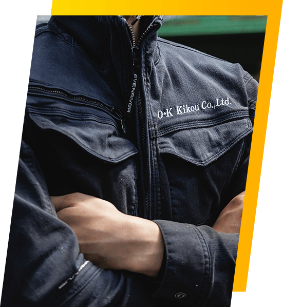 O・K機工の作業服を着たスタッフ